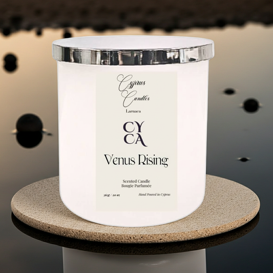 White candle with 'Cyprus Candles' label on a dark background